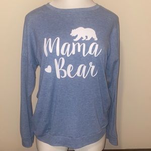 Women’s Large long sleeved tee. Light blue with the word Mama Bear on the front